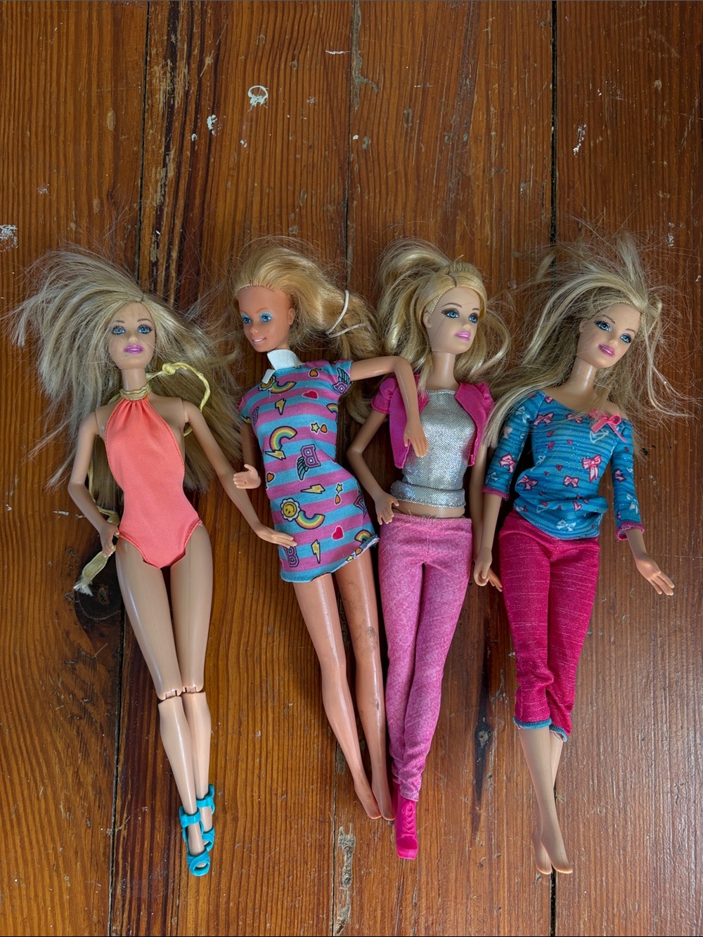 Lot of 4 1990s Y2K Barbie Dolls